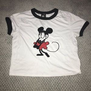 White mickey mouse shirt.